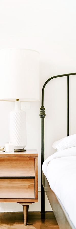 Clean and minimal bedroom design by Andi Felitz of Bevel Design & Interiors